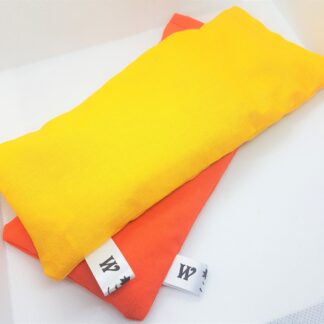 Eye pillows in orange and yellow fabric